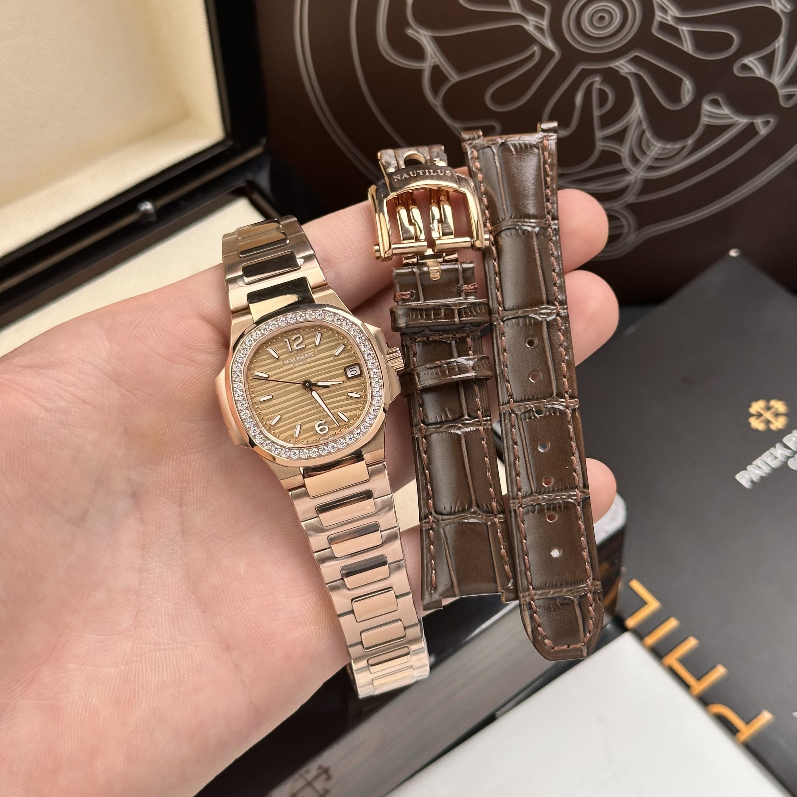 Patek Philippe Nautilus 7010 Diamonds Bezel Replica Watch GR Factory 32mm (4) Patek Philippe Nautilus 7010 Diamonds Bezel Replica Watch GR Factory 32mm (1)